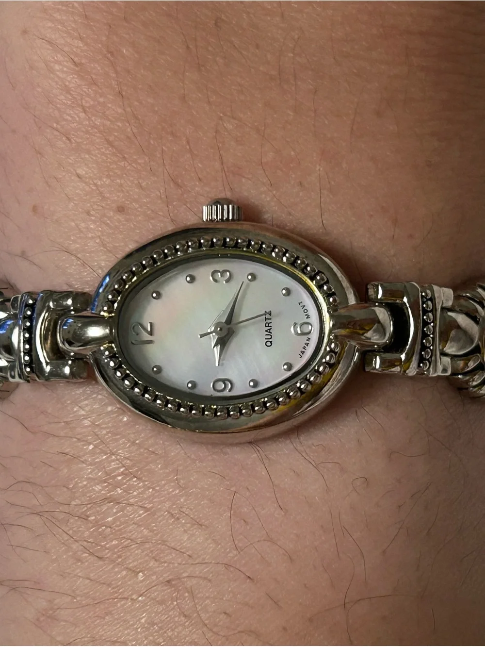 Silver Oval Bracelet Watch with Decorative Links